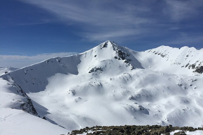 Full day Snowshoeing tour to Bezbog peak 2645 m in Pirin Mountains - The summit view toward Rila, Pirin, and Rodopi